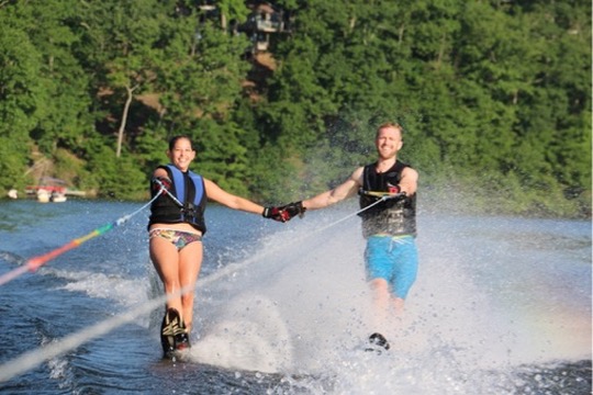 Austin and Leila waterskiing